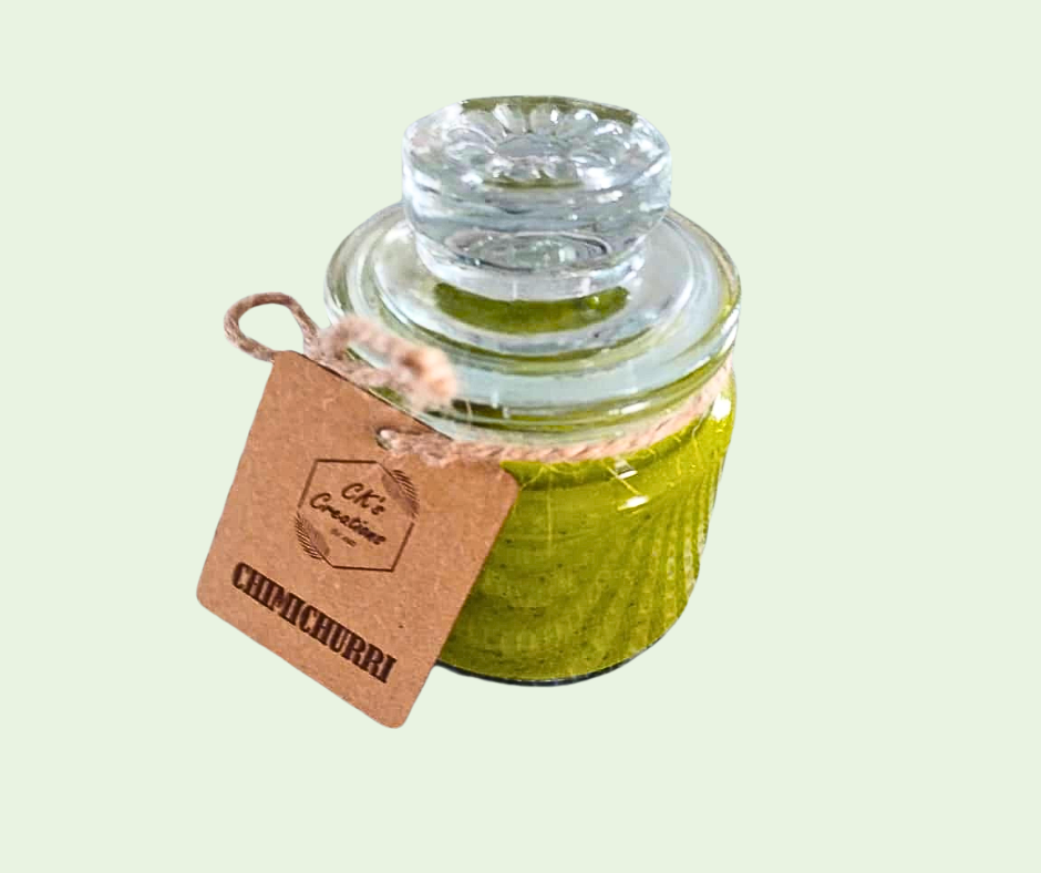 Glass jar with green contents and a brown tag on a light green background