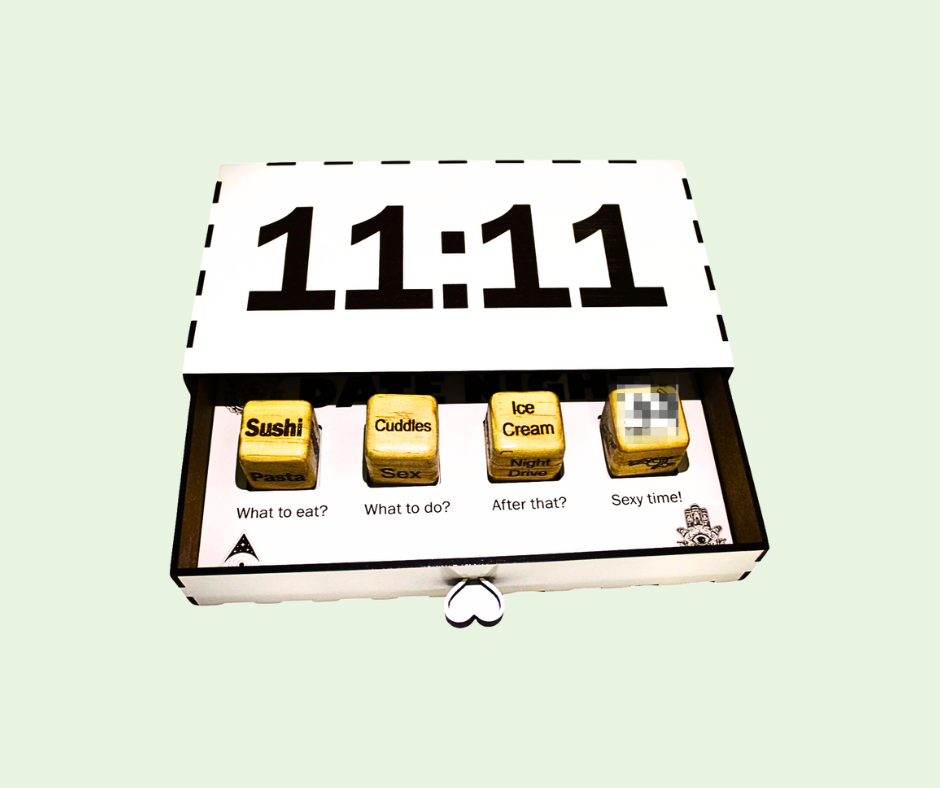 Box with wooden cubes labeled '11:11' 