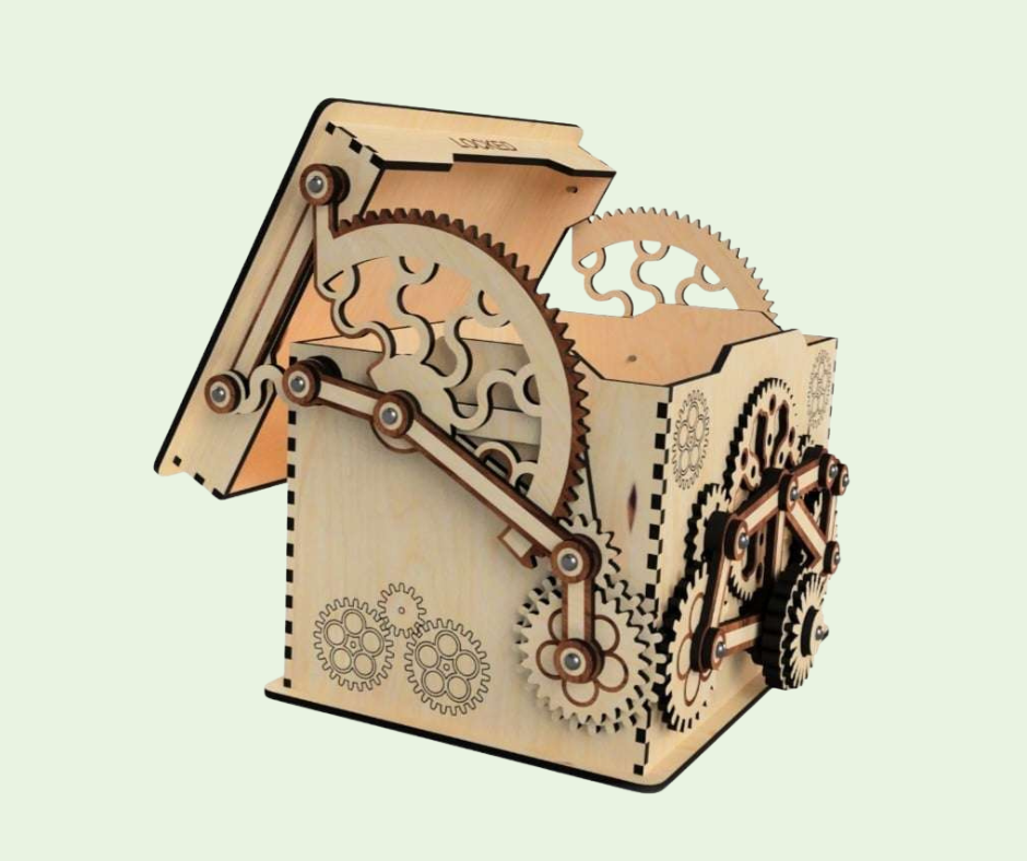 Wooden mechanical model with gears on a light green background