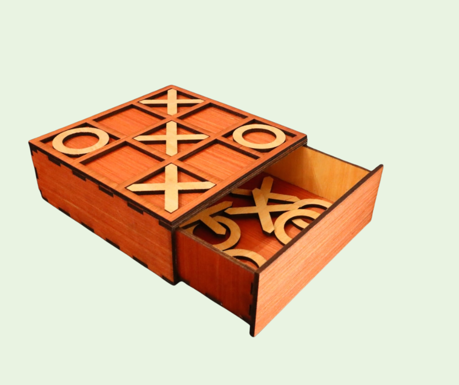 Wooden tic-tac-toe game set on a light green background